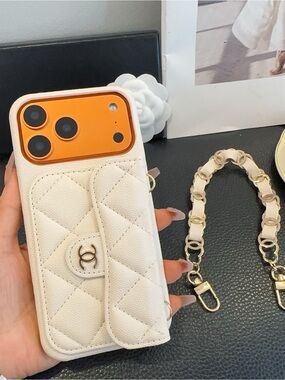 CHANEL Cream Quilted Leather Phone Case with Gold Chain Accent iPhone 17 pro max